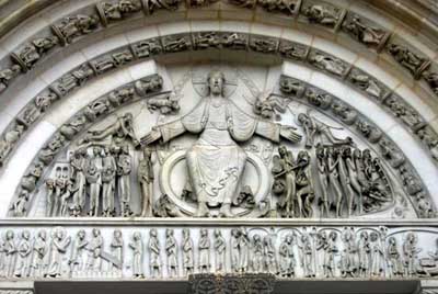 The tympanum of the portal of the Church of Mary Magdalene in the Abbey of Vezelay (Vézelay), the Department of Yonne (Yonne, France.