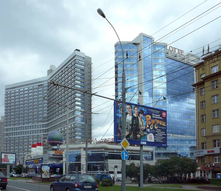 In 1960s Mikhail Posokhin-father erected Novy Arbat. In the 2000's Michael Posokhin-son has attached to Novy Arbats "books" another high-rise building. Again, it is symbolically, and one more skyscraper in the center... 
