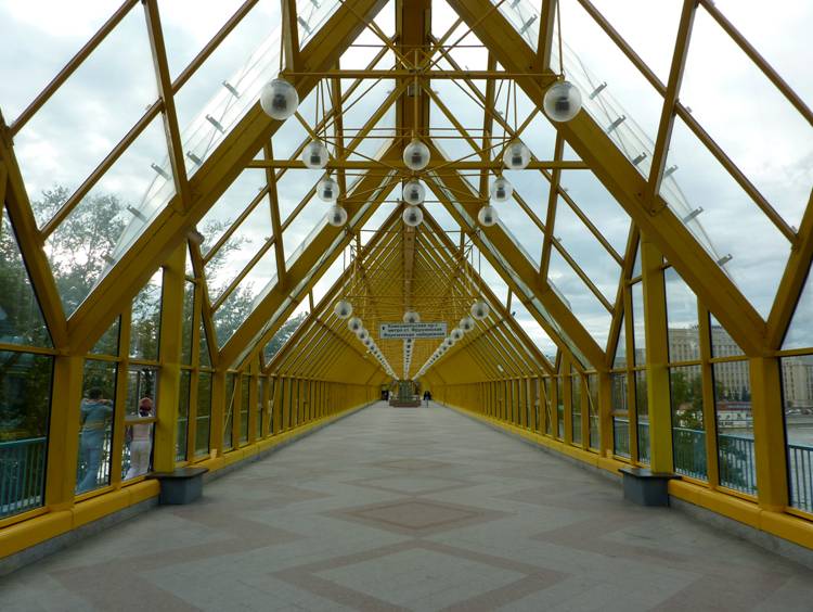 Here is the "caterpillar" inside. In summer there is stuffy and in winter  cold. And was the endless desert of yellow-brown corridor worth disfiguring of the monument of architecture? 