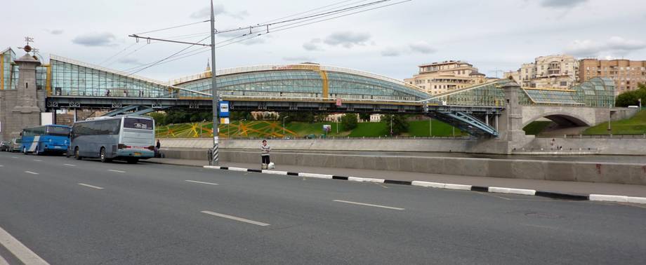 ... And the old bridge was moved, became pedestrian and disappeared under even  more pretentious "caterpillar" of architect Platonov. 