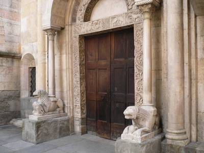 Lions at the portal of the Romanesque Cathedral in Modena.