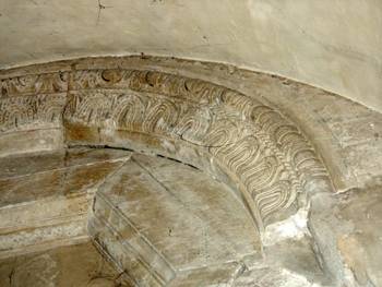 Cathedral of Speyer. Carved tree above pledged internal window in the crypt.