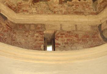 The box at the bottom of the tent of Trinity Church in the village.